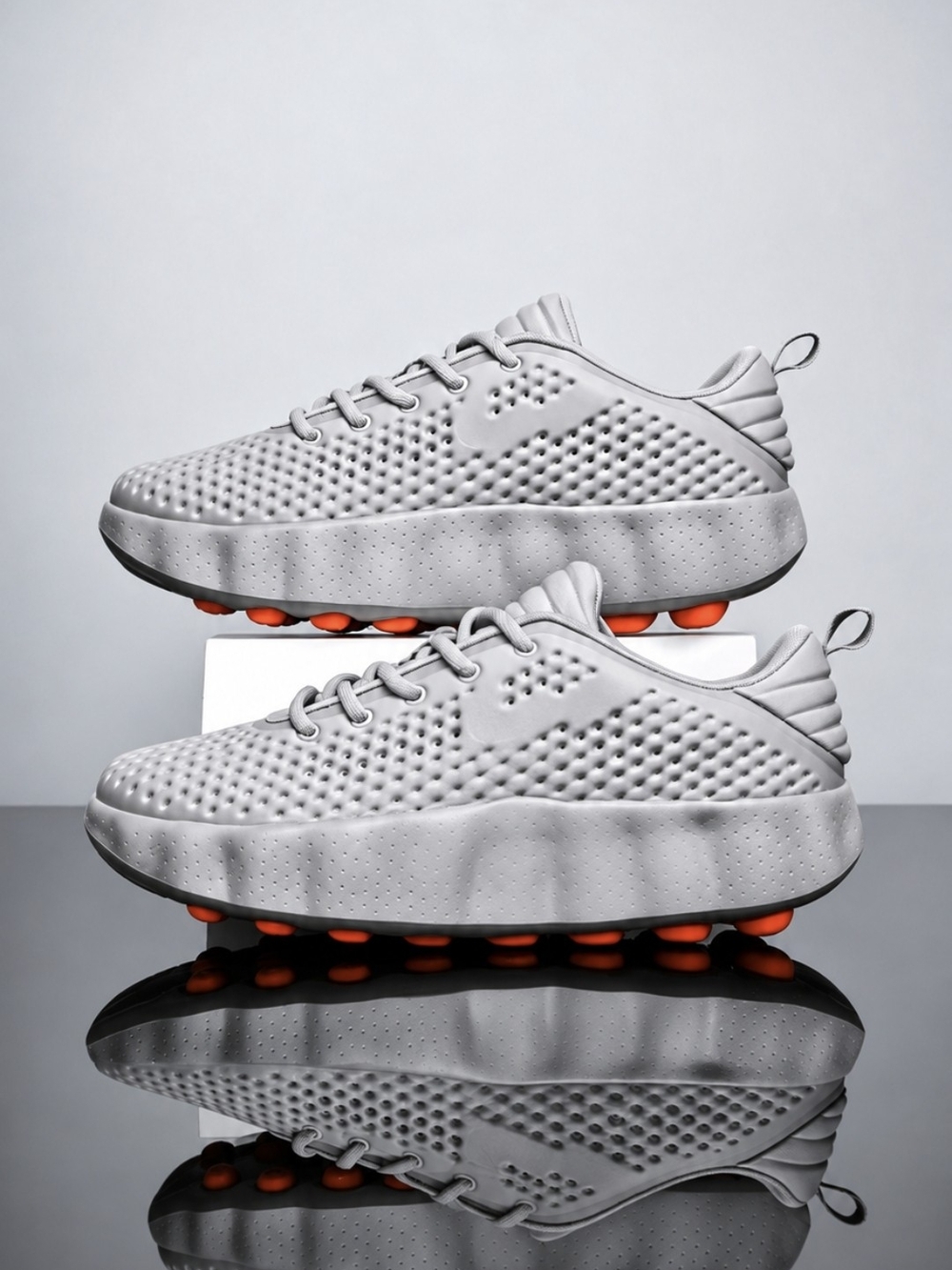 Men’s Lightweight Gray Sneakers with Orange Sole Accents
